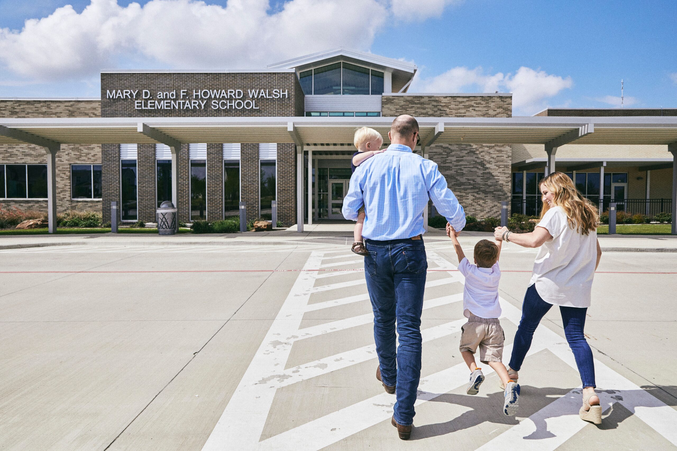 parents walking kids to school