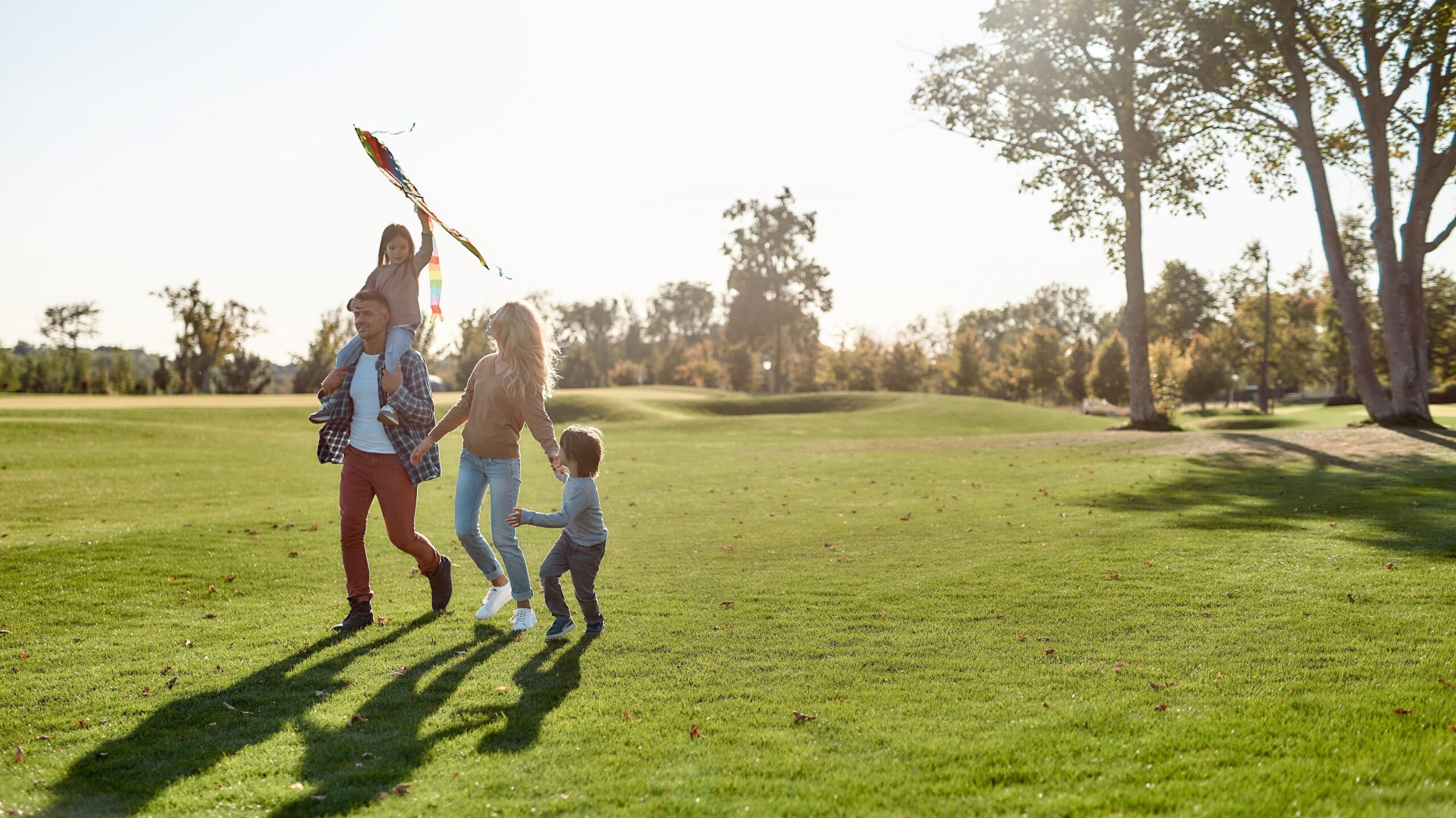 family flying a kite